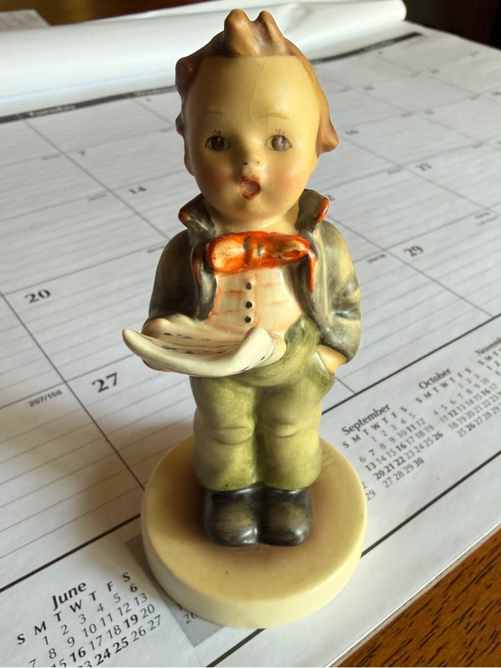 Vintage Ceramic Figurine Boy with Book - Green, Cream, Orange HUMMEL